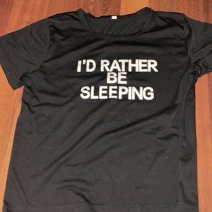 Black shirt with white letters on it